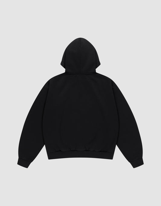 The Live Fast Garment Hooded by LIVE FAST DIE YOUNG is an oversized black hoodie shown from the back on a light gray background, featuring long sleeves, ribbed cuffs and waistband, and crafted from soft Baumwolle for comfort.