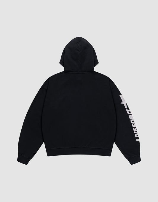 The LFDY Angel Hooded by LIVE FAST DIE YOUNG is a black oversize fit hoodie, shown from the back, featuring bold white UNIFORM text and a graphic on the right sleeve. Made from soft cotton with ribbed cuffs for comfort.