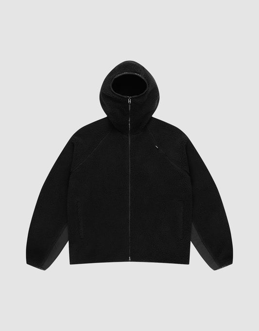 The black Live Fast Teddy Jacket by LIVE FAST DIE YOUNG, featuring raglan sleeves, long sleeves, a zip-up front, and two side pockets, is displayed against a plain light gray background with an effortlessly casual vibe. | plain