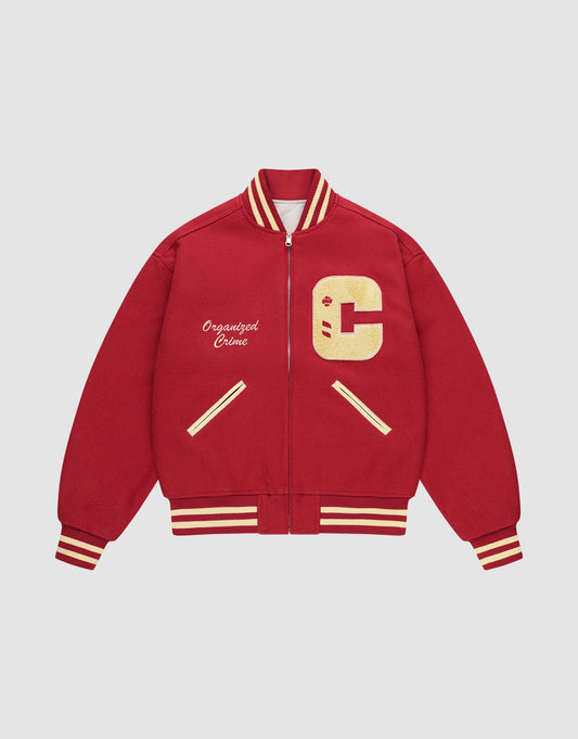 The LFDY OC College Jacket is a red varsity jacket with yellow and white striped cuffs, collar, and hem. It has a large yellow C patch on the left chest, Rücken-Stick detail, and "Organized Crime" embroidered in white on the right chest. | plain