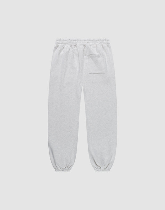 The Live Fast Amsterdam Loose Jogger by LIVE FAST DIE YOUNG features light gray 100% Baumwolle fabric, a wide elastic waistband, elastic ankle cuffs, and a single back pocket—shown on a plain white background.