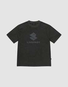 The Live Fast LF Tee by LIVE FAST DIE YOUNG is a black oversized short-sleeve shirt in 100% cotton, featuring a bold geometric front print and "LIVEFAST" in dark gray on the chest, shown against a plain light gray background. | plain