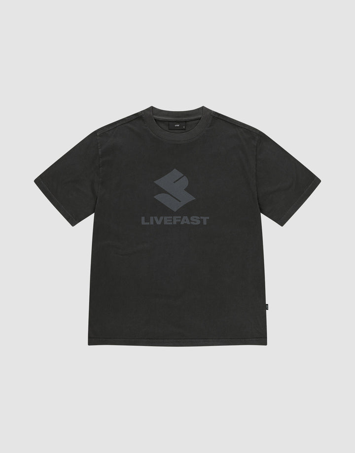 The Live Fast LF Tee by LIVE FAST DIE YOUNG is a black oversized short-sleeve shirt in 100% cotton, featuring a bold geometric front print and "LIVEFAST" in dark gray on the chest, shown against a plain light gray background. | plain