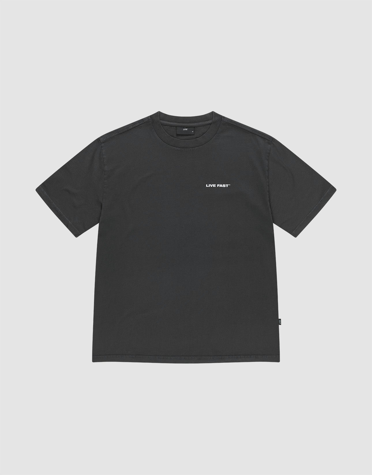 The LFDY Grand Theft Tee by LIVE FAST DIE YOUNG is a black, 100% Baumwolle oversize-fit short-sleeve shirt with "LIVE FAST" in small white letters on the left chest, shown against a light grey background.