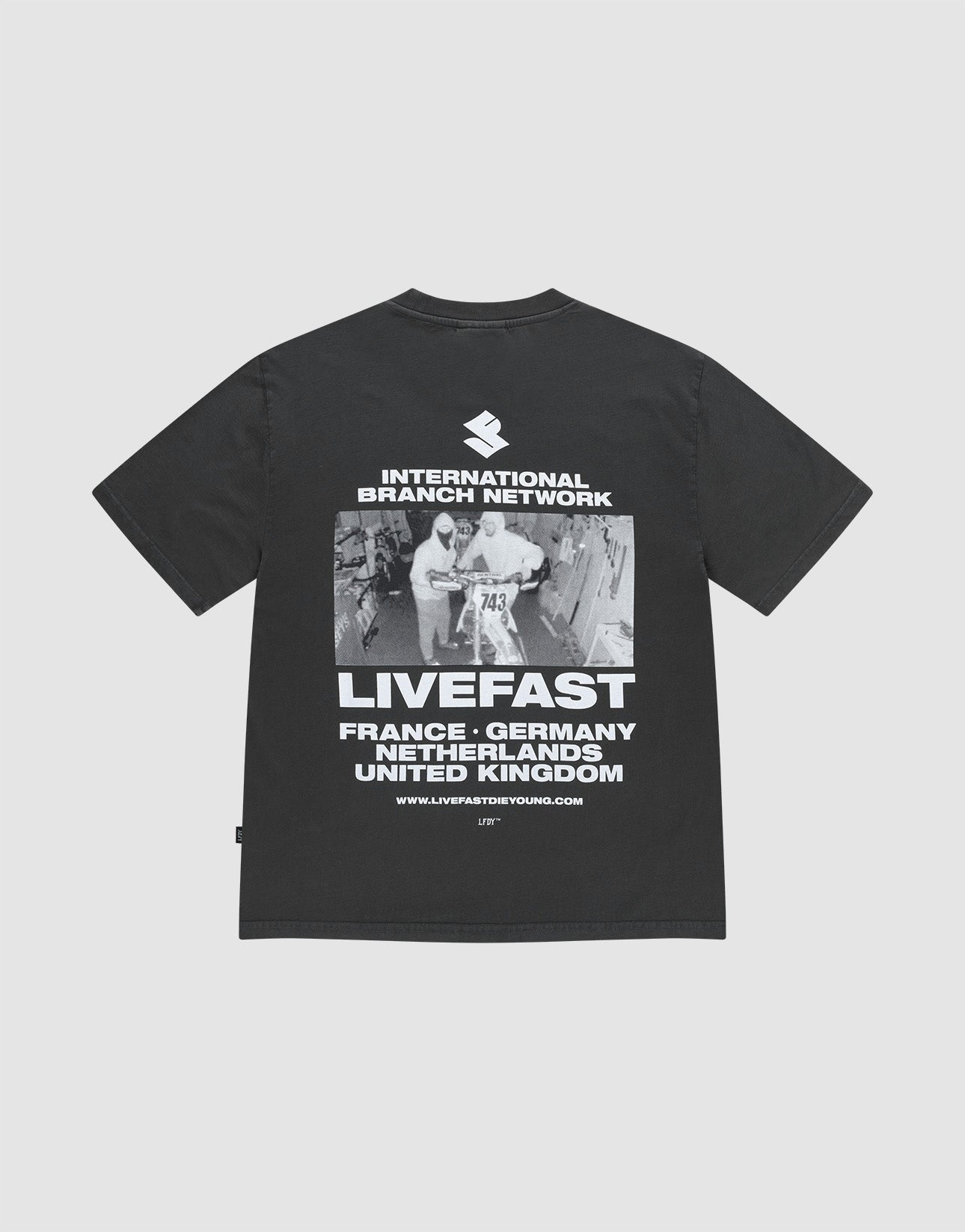 The LFDY Grand Theft Tee by LIVE FAST DIE YOUNG is an oversized black T-shirt made from 100% cotton, featuring bold front and back prints of runners, “INTERNATIONAL BRANCH NETWORK,” “LIVEFAST,” and country names. | plain