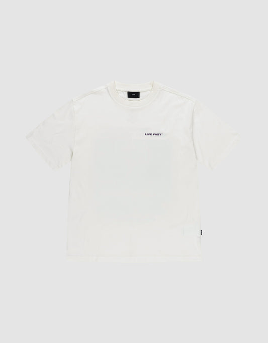 The LFDY Grand Theft Tee by LIVE FAST DIE YOUNG is a plain white oversized 100% Baumwolle short-sleeve t-shirt with a small black "LIVE FAST" text on the left chest, shown against a light grey background.