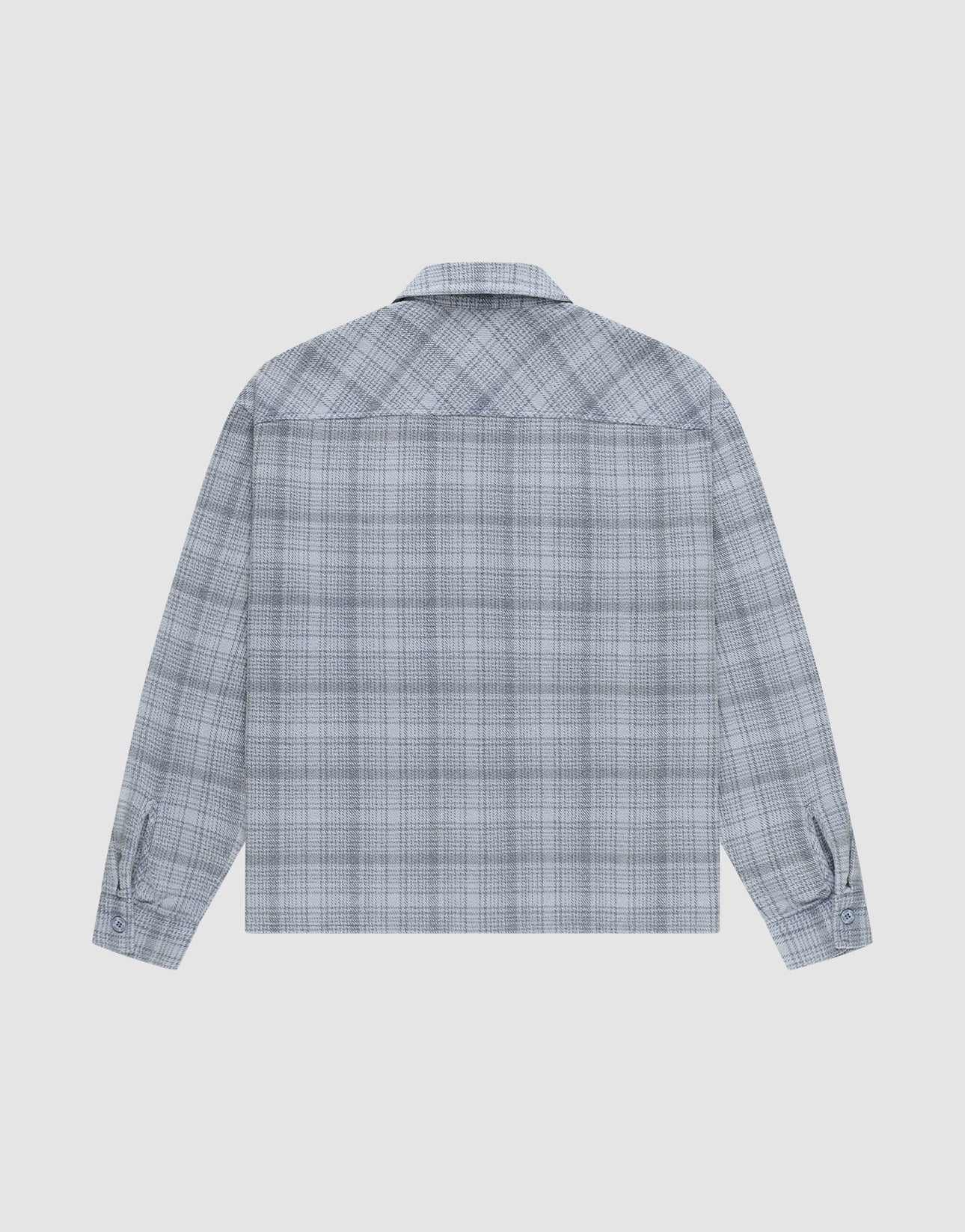 The LIVE FAST DIE YOUNG Vintage Flannel is a long-sleeve, light blue and gray plaid shirt with an oversize fit for relaxed comfort, shown from the back on a plain white background.
