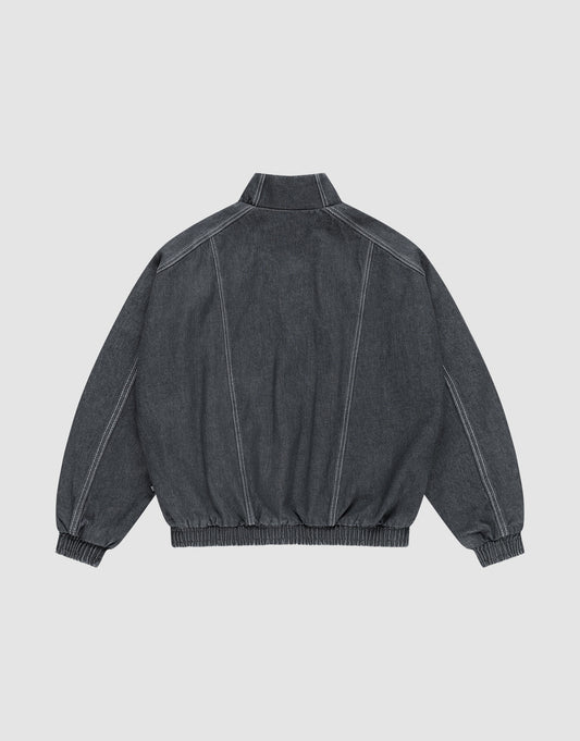 The LFDY Denim Trackjacket by LIVE FAST DIE YOUNG is a dark gray 100% Baumwolle jacket, shown from the back with prominent white stitching, Stehkragen, and elasticated cuffs and waistband.