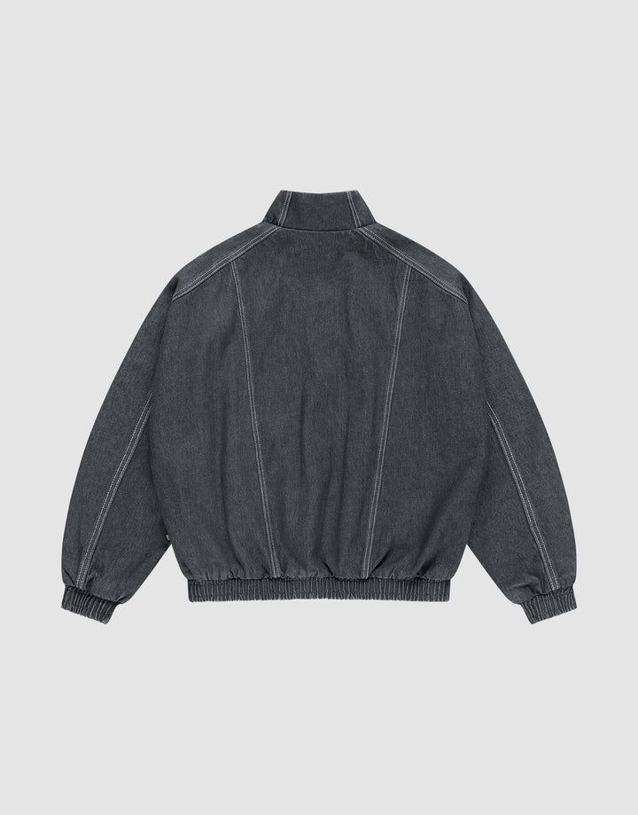 The LFDY Denim Trackjacket by LIVE FAST DIE YOUNG is a dark gray 100% Baumwolle jacket, shown from the back with prominent white stitching, Stehkragen, and elasticated cuffs and waistband.