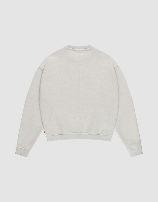 The LFDY Heavyweight Lounge Sweater by LIVE FAST DIE YOUNG is a light gray, oversize-fit sweater with long sleeves, ribbed cuffs and hem, and a crew neckline, made from 100% cotton and shown laid flat on a white background.