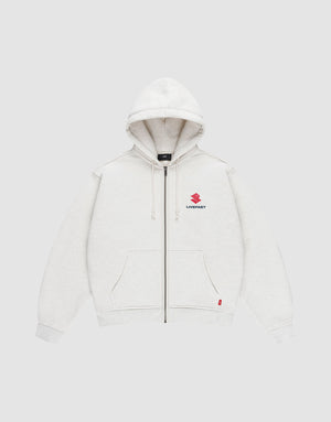 The LFDY Heavyweight Lounge Zip Hooded by LIVE FAST DIE YOUNG is a light gray, 100% Baumwolle zip-hoodie with front pockets, hood and drawstrings, minimalist design, and a small red Suzuki logo plus "LIVE FAST" on the left chest. Regular fit. | plain