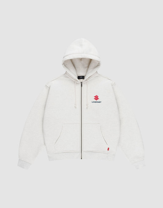 The LFDY Heavyweight Lounge Zip Hooded by LIVE FAST DIE YOUNG is a light gray, 100% Baumwolle zip-hoodie with front pockets, hood and drawstrings, minimalist design, and a small red Suzuki logo plus "LIVE FAST" on the left chest. Regular fit. | plain