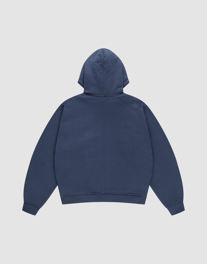 The LFDY Heavyweight Lounge Hooded by LIVE FAST DIE YOUNG is shown flat, back-up, in dark blue 100% cotton with long sleeves and a relaxed regular fit. No visible logos or designs appear against the light gray background.