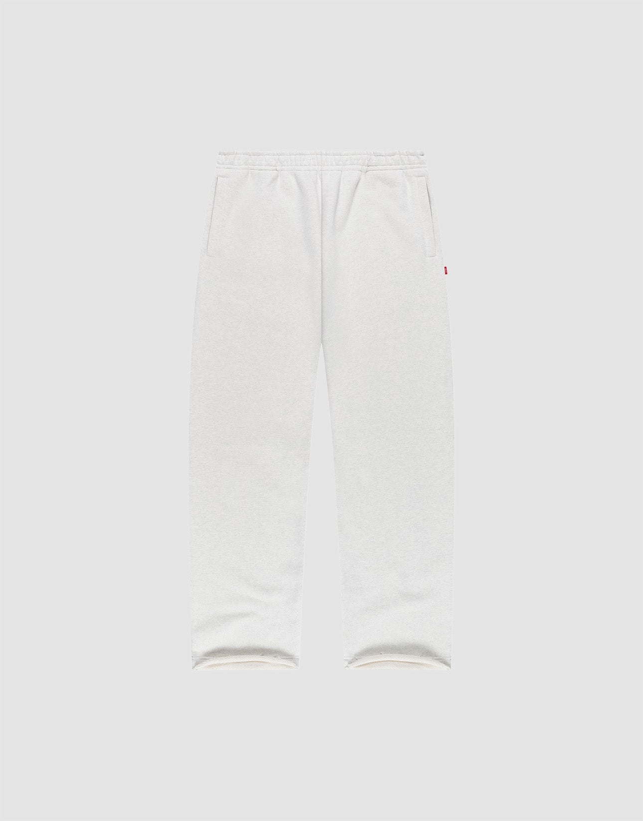 LIVE FAST DIE YOUNG LFDY Heavyweight Loungepants in white wide fit, made from 650gsm Baumwolle with elastic waistband and side pockets, shown flat on a plain light gray background. | plain