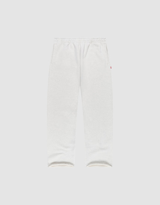 LIVE FAST DIE YOUNG LFDY Heavyweight Loungepants in white wide fit, made from 650gsm Baumwolle with elastic waistband and side pockets, shown flat on a plain light gray background. | plain