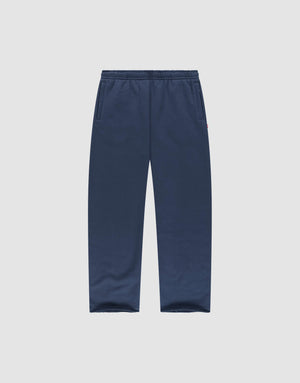 LIVE FAST DIE YOUNG LFDY Heavyweight Loungepants in navy blue, made from 650gsm 100% Baumwolle, feature an elastic waistband and side pockets, shown laid flat on a plain light gray background. | plain