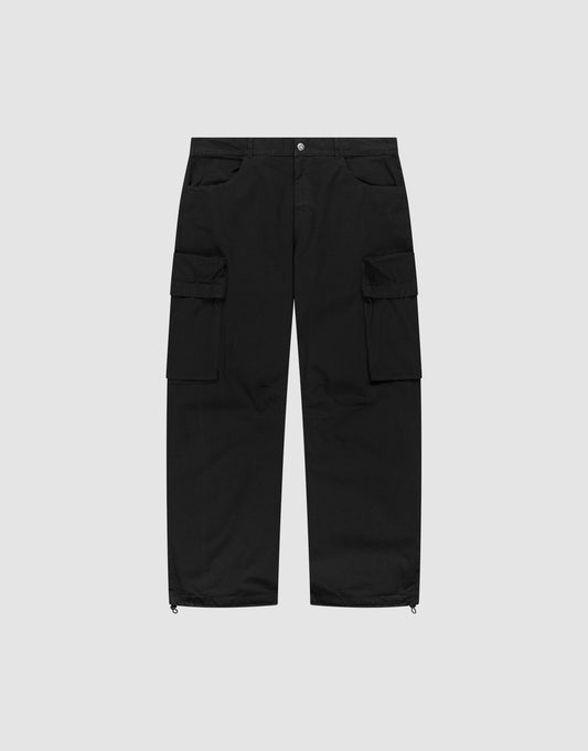 The LFDY Baggy Cargo by LIVE FAST DIE YOUNG features a baggy fit, 100% cotton build, multiple side cargo pockets, button and zip closure, and adjustable cuff drawstrings, shown flat on a light gray background. | plain