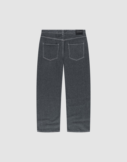 Back view of LFDY Baggy Denim by LIVE FAST DIE YOUNG in dark gray with two back pockets and white stitching, laid flat on a light background. Made from 100% Baumwolle for comfort and durability.