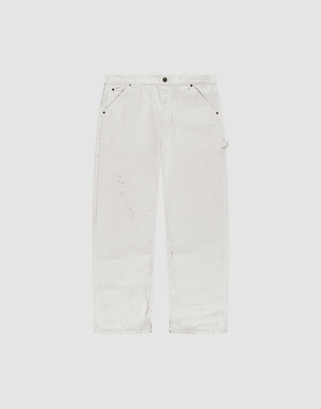 LIVE FAST DIE YOUNG Worker Pants shown flat on a light gray background. These white denim carpenter pants feature a baggy fit, straight legs, subtle distressing, side carpenter pockets, hammer loop, and are made from 100% Baumwolle.