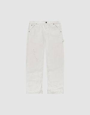 LIVE FAST DIE YOUNG Worker Pants shown flat on a light gray background. These white denim carpenter pants feature a baggy fit, straight legs, subtle distressing, side carpenter pockets, hammer loop, and are made from 100% Baumwolle. | plain