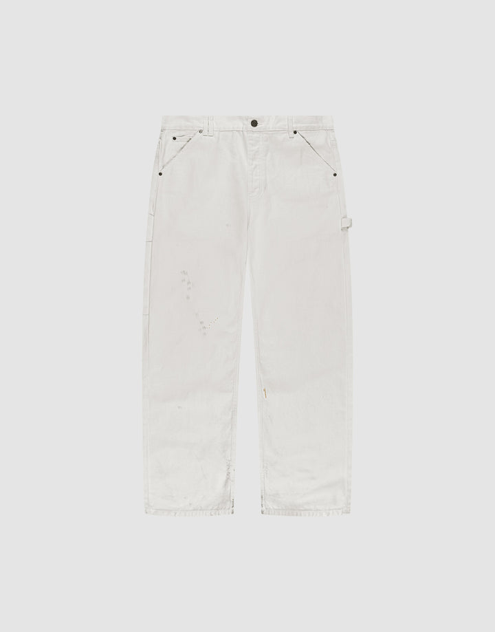 LIVE FAST DIE YOUNG Worker Pants shown flat on a light gray background. These white denim carpenter pants feature a baggy fit, straight legs, subtle distressing, side carpenter pockets, hammer loop, and are made from 100% Baumwolle. | plain