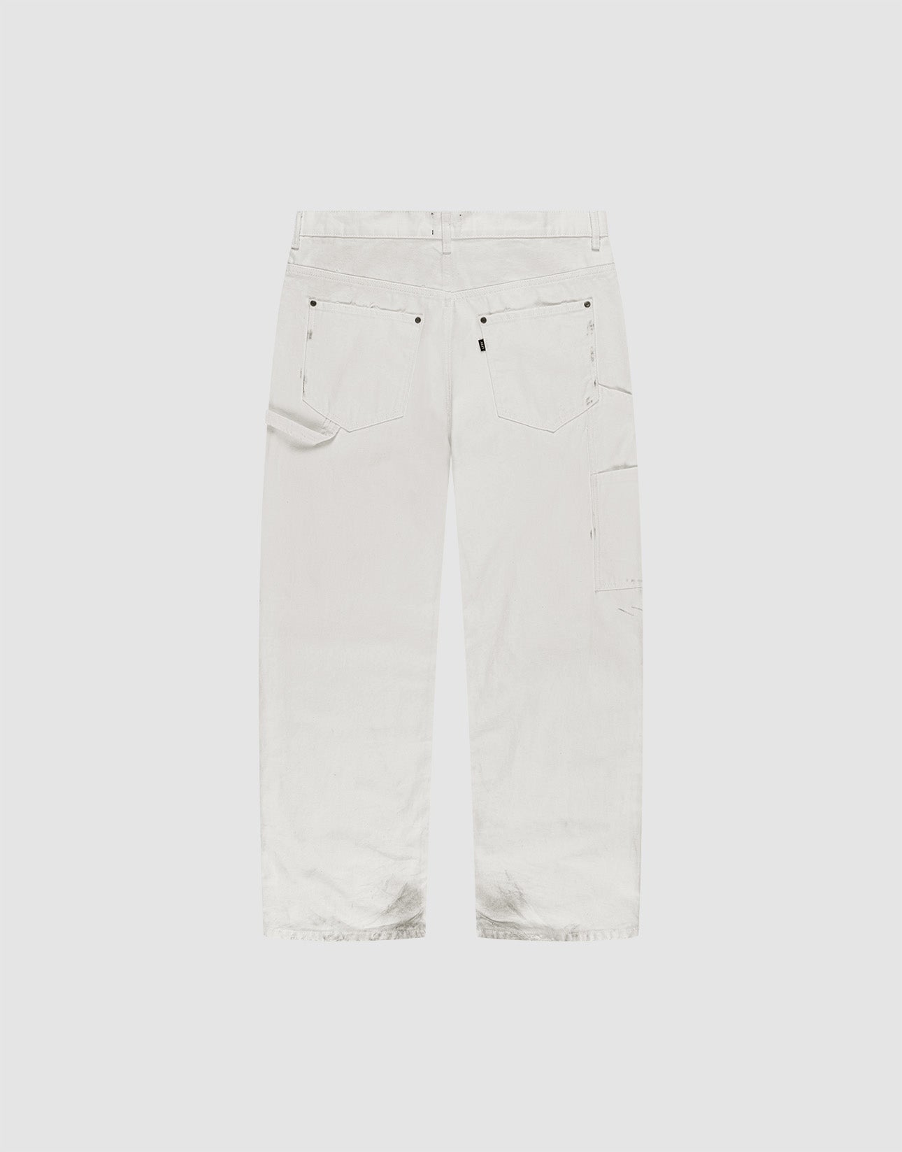 Back view of LIVE FAST DIE YOUNG Worker Pants in white: baggy fit, straight legs, large back pockets, carpenter pocket, visible seams. Crafted from 100% Baumwolle and shown against a plain light background.