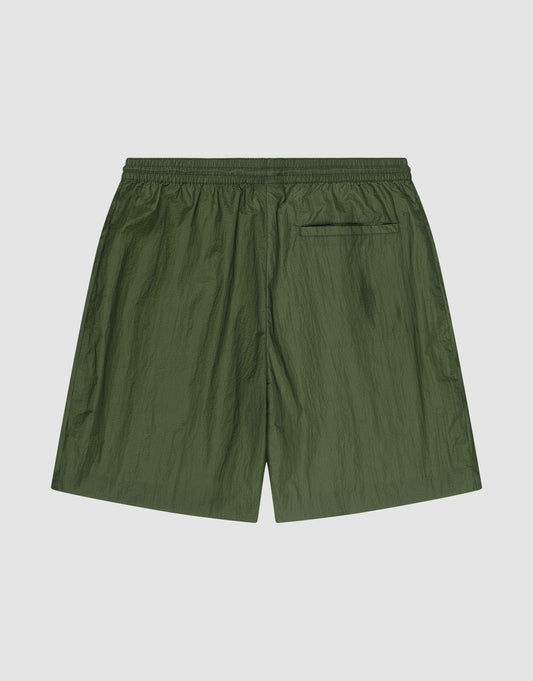 LFDY Nylon Trackshorts by LIVE FAST DIE YOUNG in olive green feature a wide fit, elastic waistband, single back pocket, and subtle logo print, shown laid flat on a plain light background.