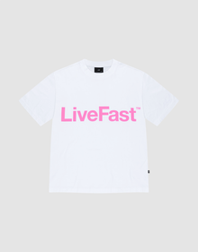 The Basic OS Livefast Tee by LIVE FAST DIE YOUNG features an oversize fit and a bold pink LiveFast™ frontprint on plain white, showcased laid flat against a light gray background. | plain