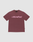 The Basic +49 Tee by LIVE FAST DIE YOUNG is a maroon oversized short-sleeve shirt with a large pink +49LiveFast™ front print, made from 100% cotton and shown on a plain light gray background.