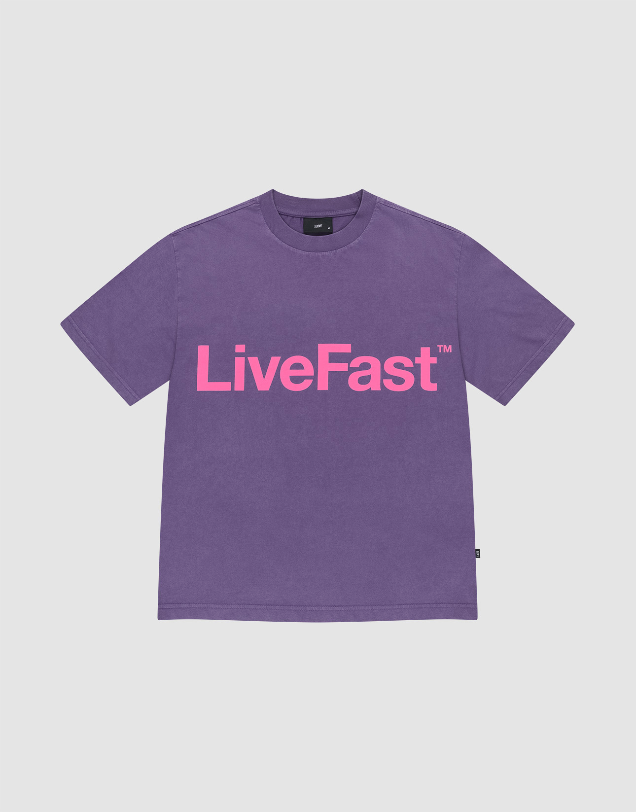The Basic OS Livefast Tee by LIVE FAST DIE YOUNG is a purple t-shirt with a bold Frontprint: LiveFast™ in large pink letters. Made from 100% Baumwolle, it features short sleeves and a round neckline for all-day comfort.