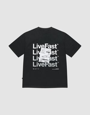 LIVE FAST DIE YOUNG's Basic Evidence Tee is an oversize black shirt featuring repeated white LiveFast™ text and a bold receipt graphic backprint. Made of 100% cotton (Baumwolle), shown on a plain light gray background. | plain