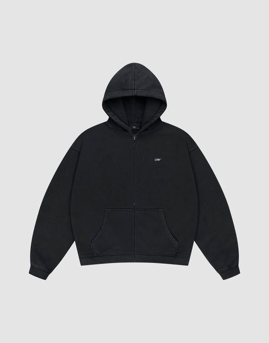 The Basic Evidence Hooded Zip by LIVE FAST DIE YOUNG is a plain black oversized zip-up hoodie with front pockets, a hood, and small white LIFT text on the left chest, shown against a light gray background.