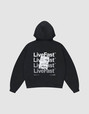 The LIVE FAST DIE YOUNG Basic Evidence Hooded Zip is a black oversized hoodie with repeated white "LiveFast™" and LFDY branding on the back, layered with a printed receipt graphic. Features a zip front and classic hood up style. | plain