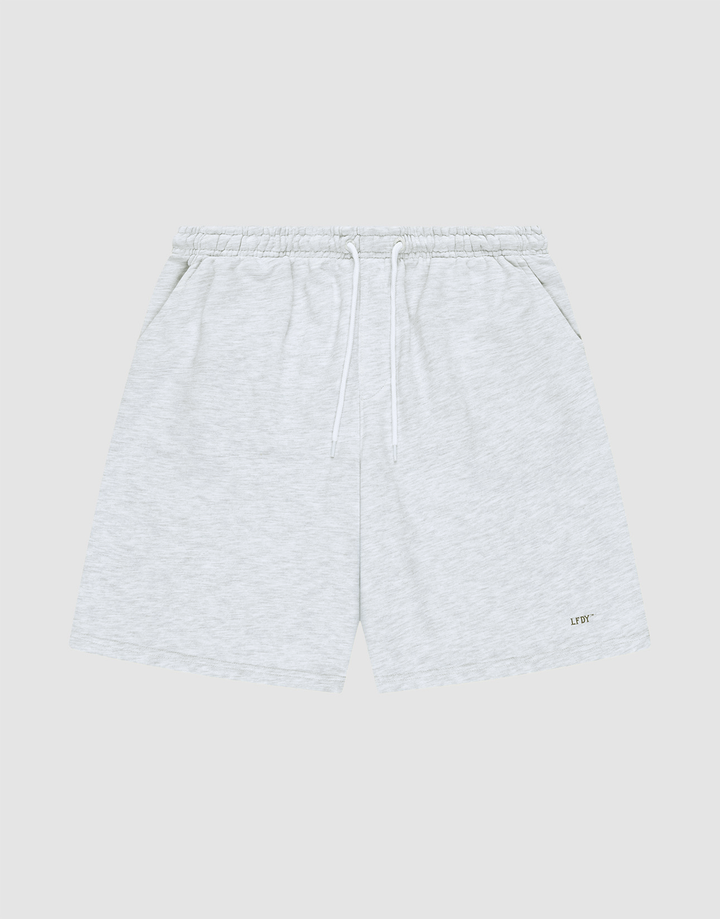 LIVE FAST DIE YOUNG Basic Shorts in light gray feature a logo-print on the lower left leg, elastic waistband with white drawstring, side pockets, and a regular fit. Displayed on a plain gray background. | plain