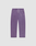 The Basic Wide Jogger by LIVE FAST DIE YOUNG features a purple color, elastic waistband, white drawstring, side pockets, and a relaxed wide fit. Shown laid flat on a plain light grey background.
