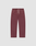 The Basic Wide Jogger by LIVE FAST DIE YOUNG features a burgundy color, elastic waistband, white drawstring, side pockets, and a small white LIVI logo-print on the left hip. The wide fit pants are shown laid flat on a light background.