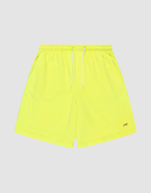 Basic Shorts by LIVE FAST DIE YOUNG in neon yellow, feature an elastischer Bund, white drawstring, side pockets, regular fit, and a small LFTD logo-print near the hem. Displayed on a light grey background. | plain