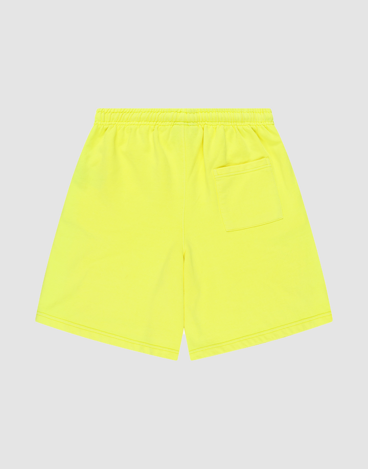 The LIVE FAST DIE YOUNG Basic Shorts are bright yellow with a regular fit, an elastic waistband, and a single back right patch pocket, shown flat on a plain light gray background.