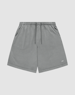 LIVE FAST DIE YOUNG Basic Shorts in gray with a faded finish feature an elastic waistband, side pockets, and a small white LIFY logo on the lower left leg, shown against a plain light background. | plain