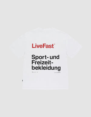 The Basic Trademark Tee by LIVE FAST DIE YOUNG is a white Oversize Fit shirt made from 100% cotton, with a bold red "LiveFast" front print and "Sport- und Freizeitbekleidung" back print, shown on a plain light gray background. | plain