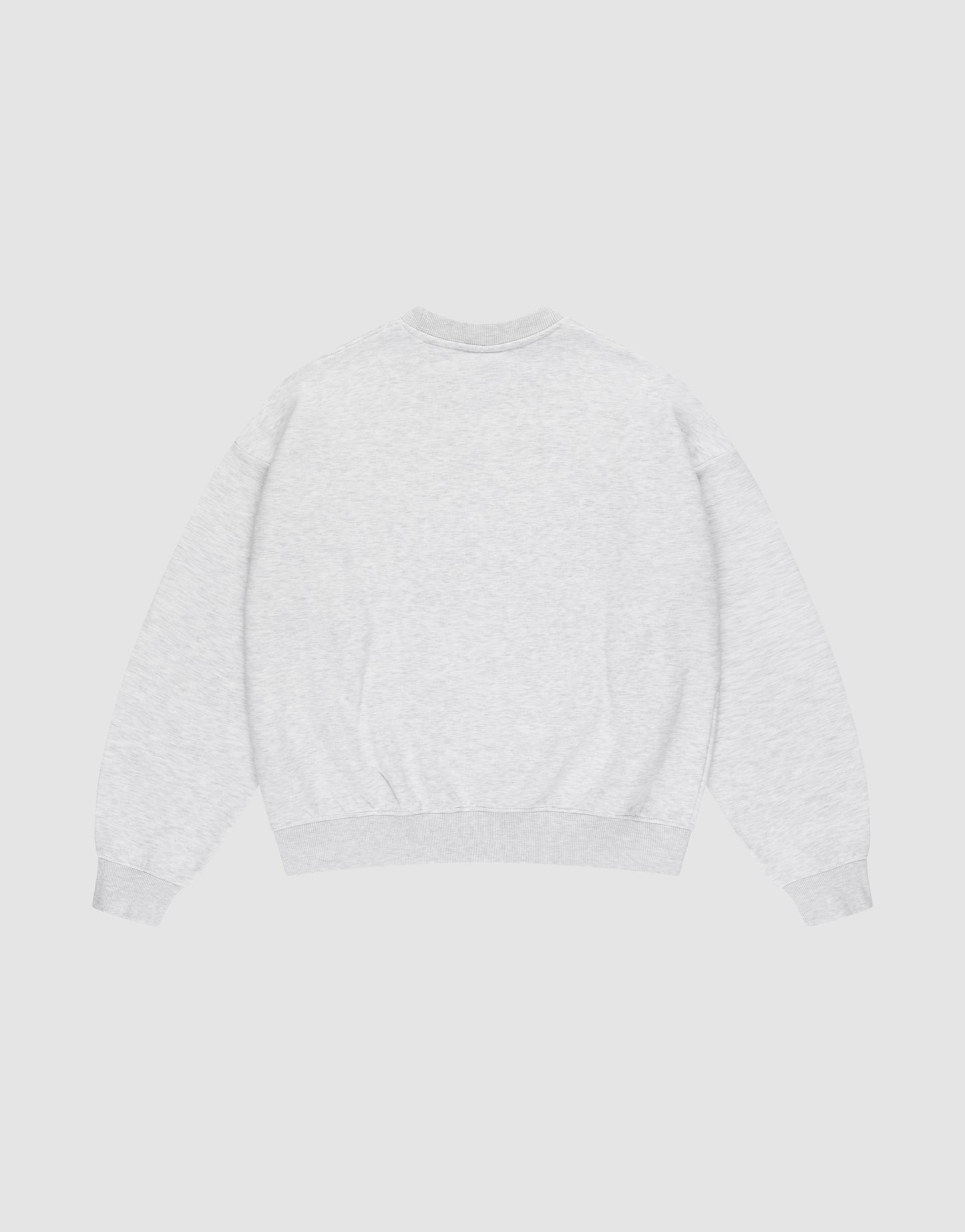 The LIVE FAST DIE YOUNG Basic LiveFast Sweater is an oversize fit, light gray crewneck with long sleeves and ribbed cuffs, hem, and neckline. It’s laid flat, back view, on a white background. Made from soft Baumwolle for everyday comfort.