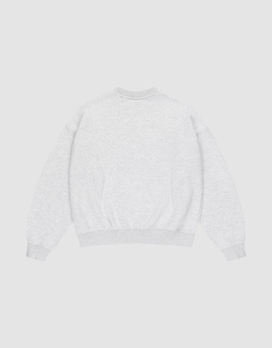 The LIVE FAST DIE YOUNG Basic LiveFast Sweater is an oversize fit, light gray crewneck with long sleeves and ribbed cuffs, hem, and neckline. It’s laid flat, back view, on a white background. Made from soft Baumwolle for everyday comfort.