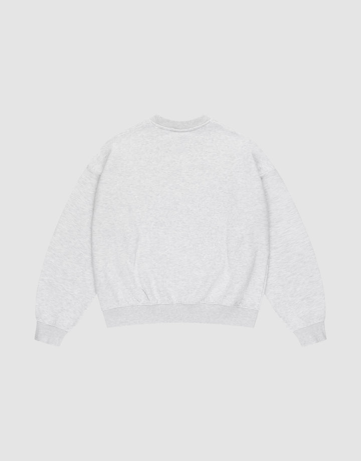 The LIVE FAST DIE YOUNG Basic LiveFast Sweater is an oversize fit, light gray crewneck with long sleeves and ribbed cuffs, hem, and neckline. It’s laid flat, back view, on a white background. Made from soft Baumwolle for everyday comfort.