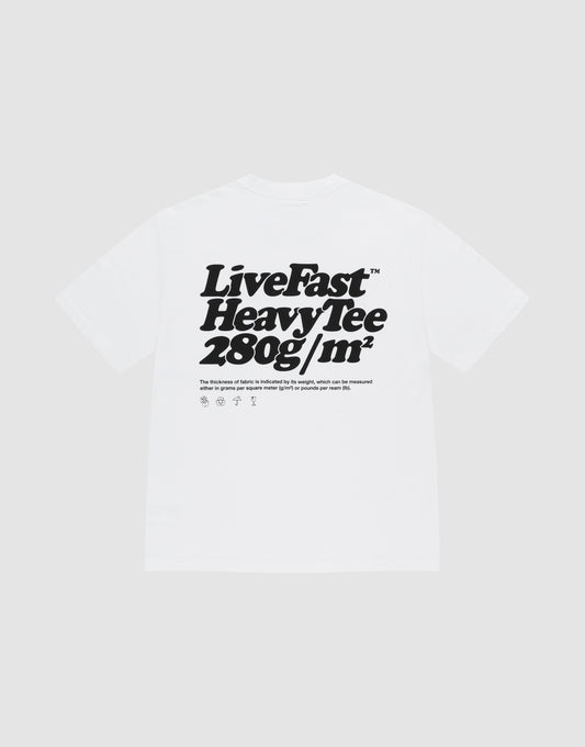 A white Basic 280 Tee by LIVE FAST DIE YOUNG in an oversize fit, made from 100% cotton, features bold black front and back "Live Fast Heavy Tee 280g/m²" prints with smaller text and laundry care symbols underneath. | plain