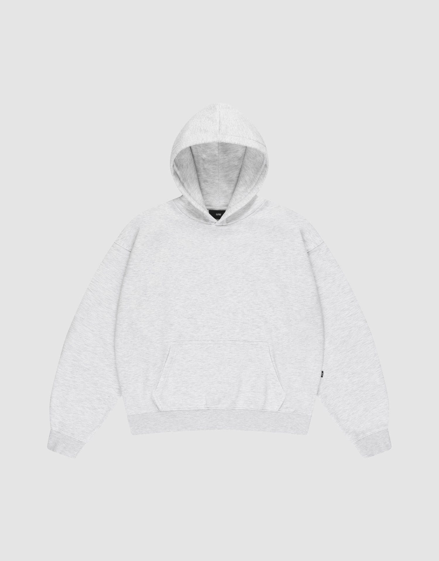 The LIVE FAST DIE YOUNG Basic Blank Hooded features an oversize fit, long sleeves, front pocket, ribbed cuffs and hem, a subtle Flag-Label detail, and is made from soft Baumwolle. Shown laid flat on a plain white background. | plain