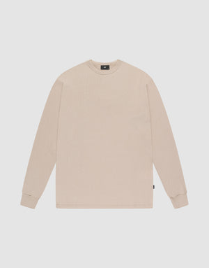 The LIVE FAST DIE YOUNG Basic Regular Rib Longsleeve in plain beige features a crewneck, long sleeves, regular fit, and ribbed cuffs, shown laid flat on a white background. | plain