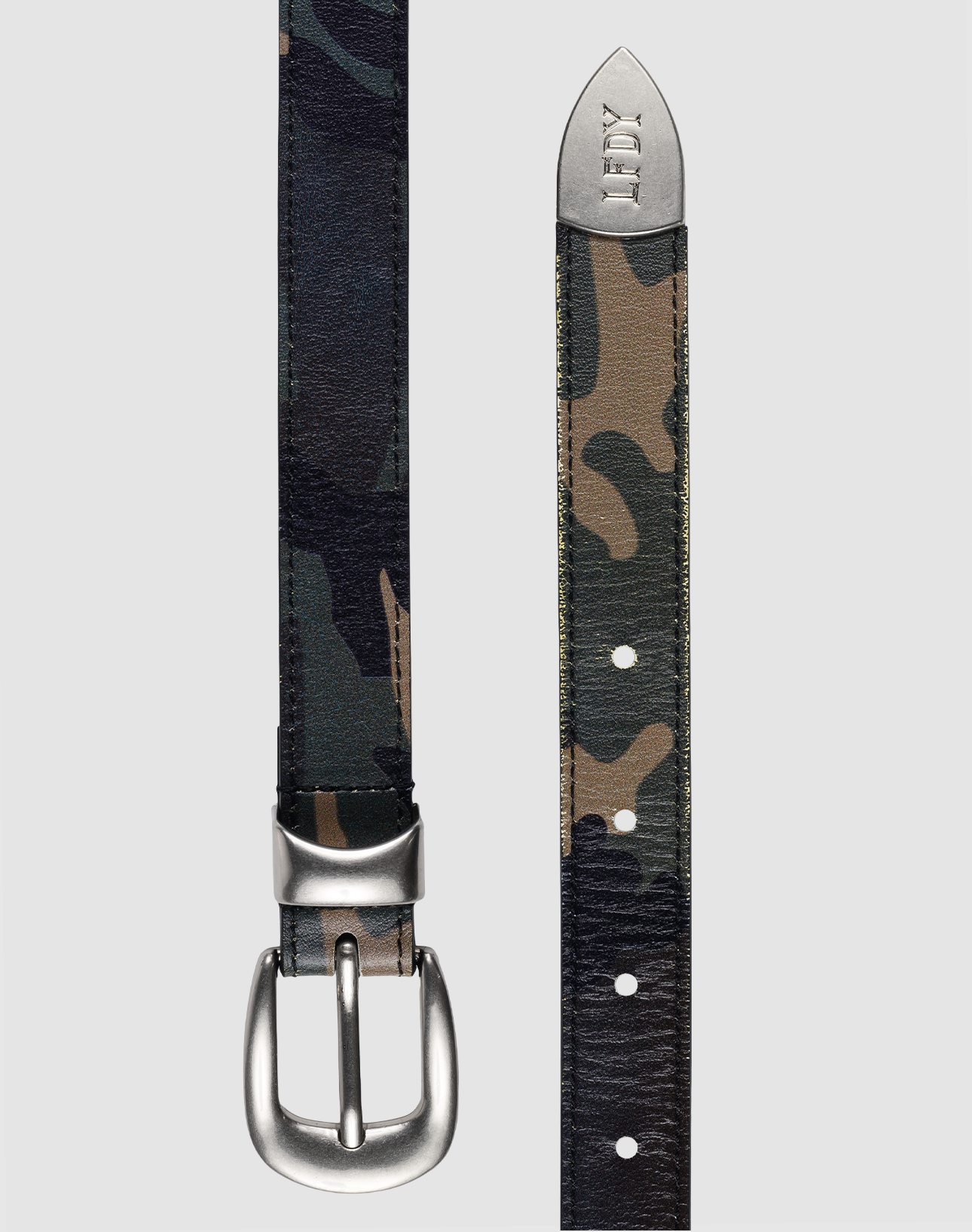 The LFDY Slim Belt by LIVE FAST DIE YOUNG, shown in camouflage with a silver buckle and IDX engraved on the silver tip, lies flat against a light gray background.