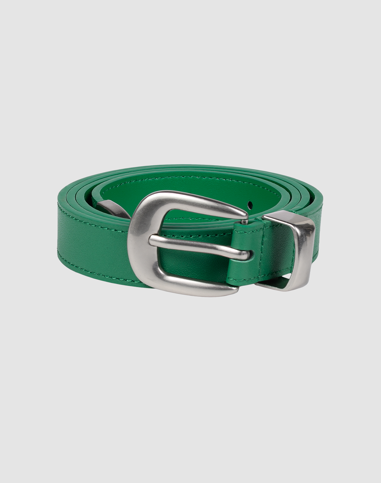 The LFDY Slim Belt by LIVE FAST DIE YOUNG, in green with a shiny silver buckle, model LF2606-20551, is rolled up and shown against a light gray background, highlighting its elegant design and impressive length. | plain