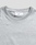 A close-up of the LFDY Slim Tee by LIVE FAST DIE YOUNG in plain light gray, featuring a collar with a white neck tag showing LFDY, size M, Flag-Label details, and crafted from soft Baumwolle.