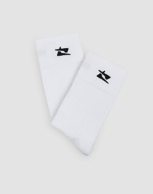 The Live Fast Performance Socks by LIVE FAST DIE YOUNG are white crew socks (Double Sizes 44-48), made from soft cotton with a black abstract logo near the top, shown on a light gray background.